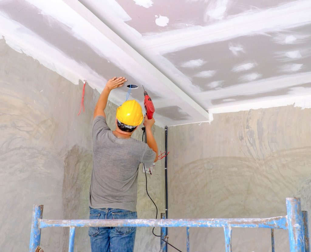 A photo from the work process of drywall repair and installation in lLondon. Showing professional drywall services for locals. Definitely showing that our Handyman in London is the most reliable service.